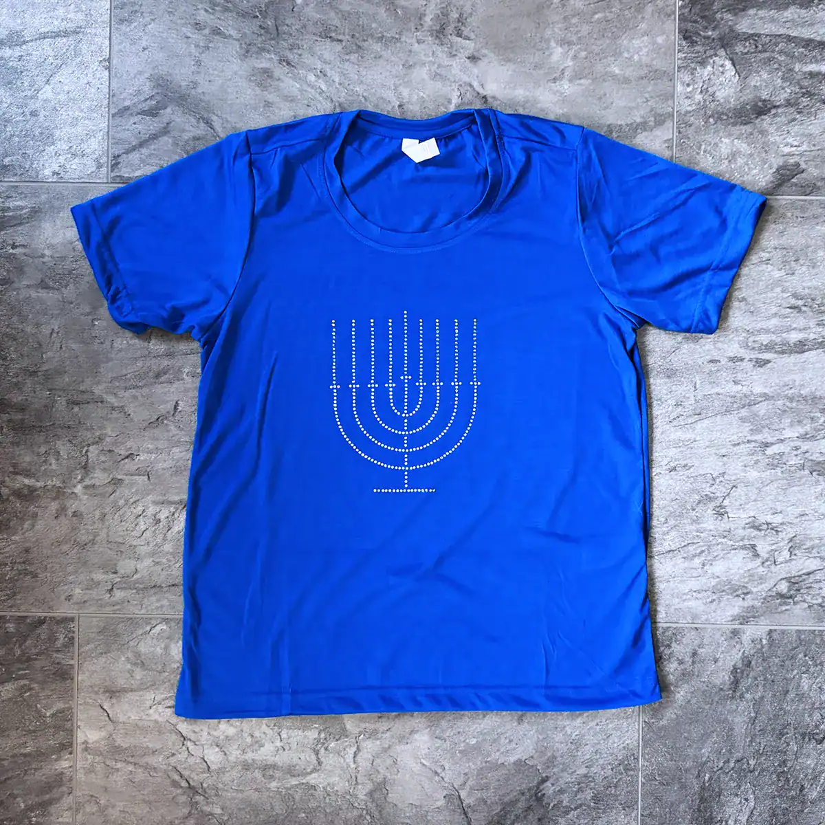 rhinestone menorah on royal blue shirt